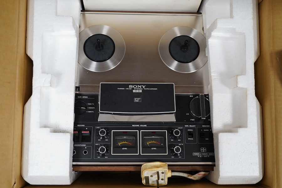 A Sony TC-377 reel to reel stereo tape deck with Sony DP-16 dust protector, both in original card boxes, together with a quantity of reels in their card boxes, plus a Lutraphone microphone on stand and a Sony stereo micr